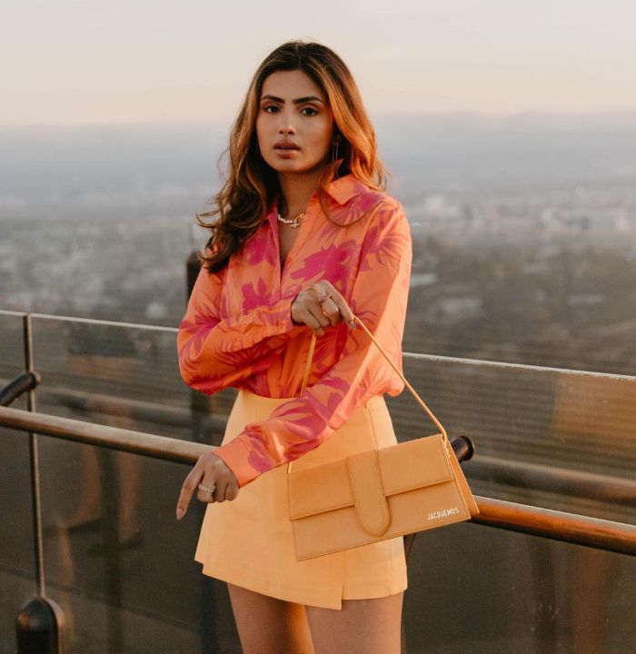 Leather Skirt With A Coral Color Button Down Collar Shirt