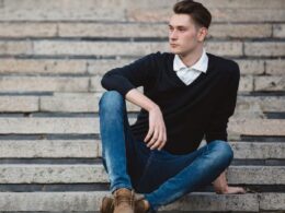 fashionable, handsome man wearing black shirts with brown shoes